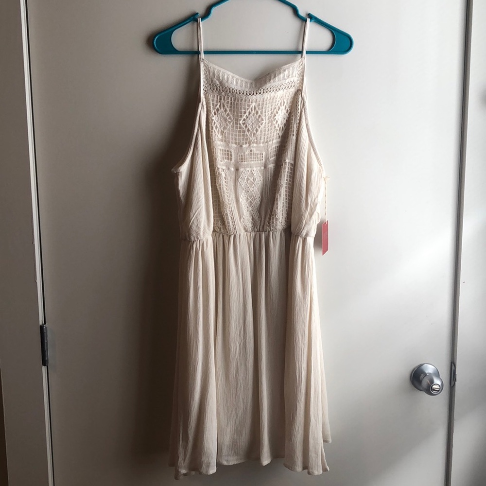 NWT Cream sleeveless crochet neck dress